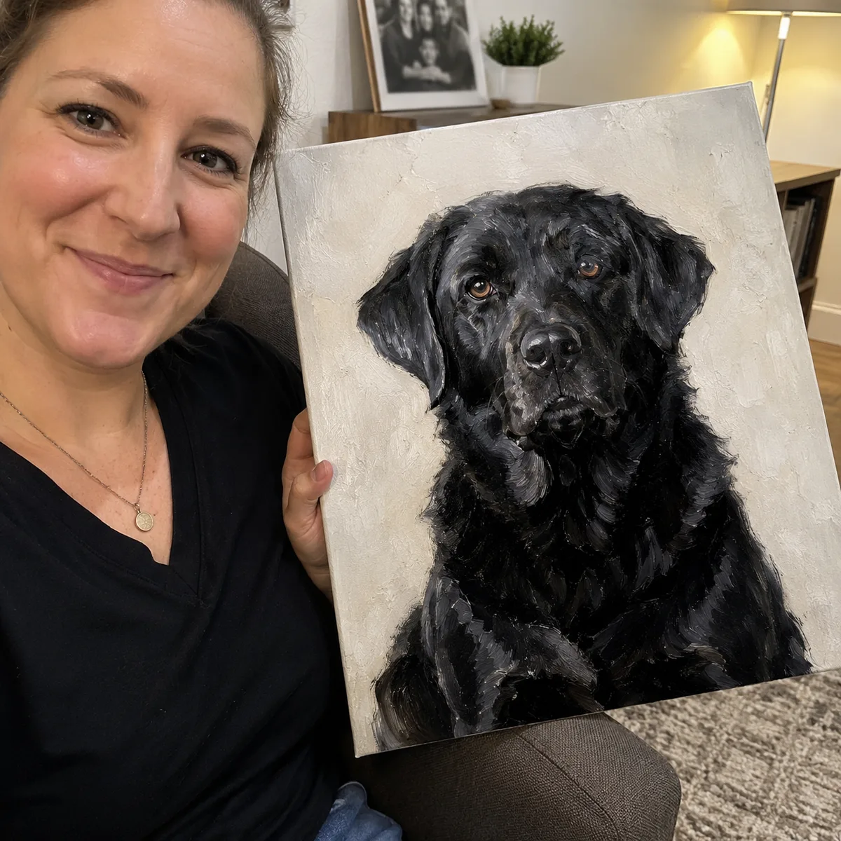 Customer holding black lab oil painting canvas portrait