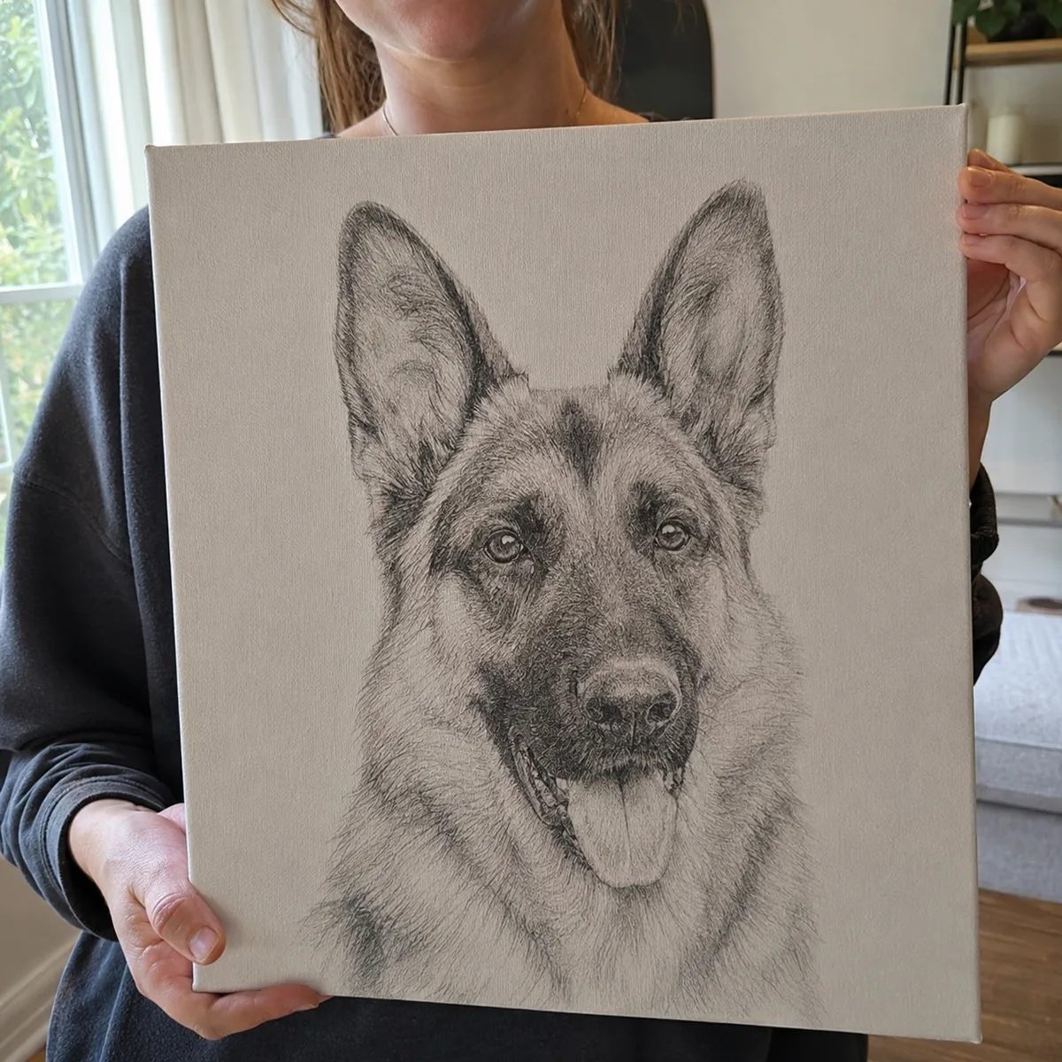 Customer holding German shepherd pencil sketch canvas portrait